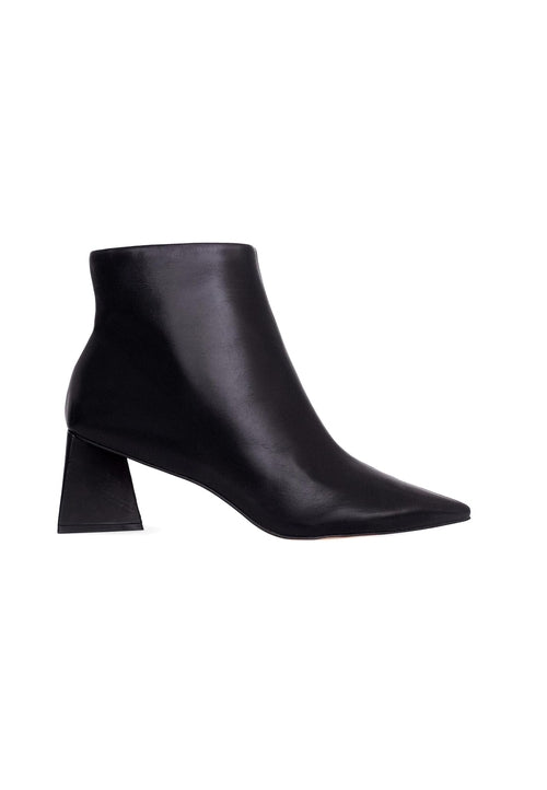 Black ankle boot on a white background