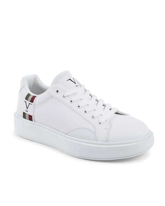 White sneakers on white background