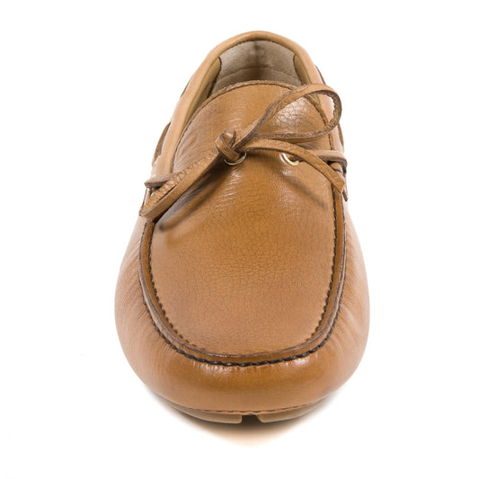 Brown leather loafer shoe on a white background
