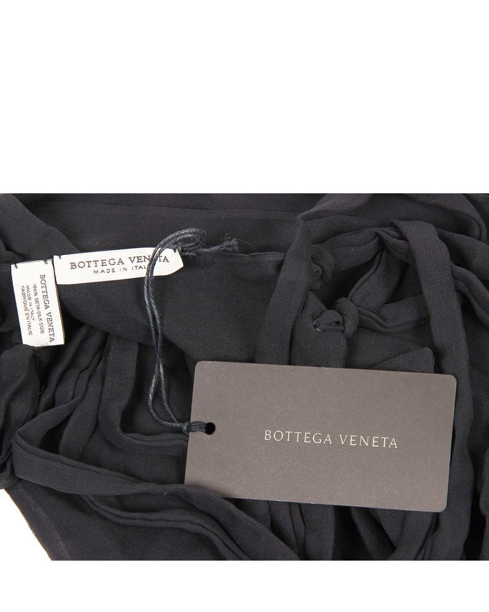 Black scarf with Bottega Veneta tags on a white background