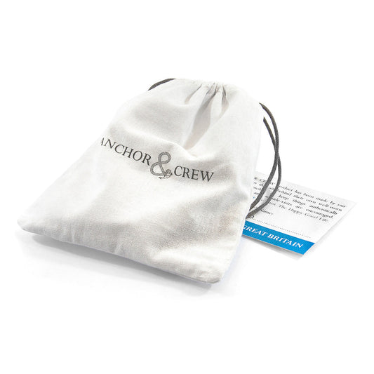 White drawstring bag with 'Anchor & Crew' branding on a white background