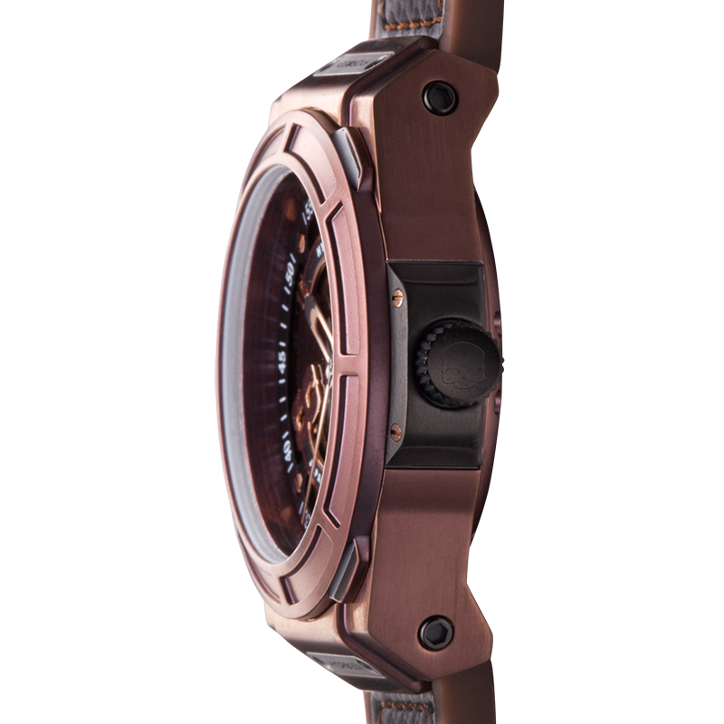 Close-up of a rose gold watch with a detailed face on a white background