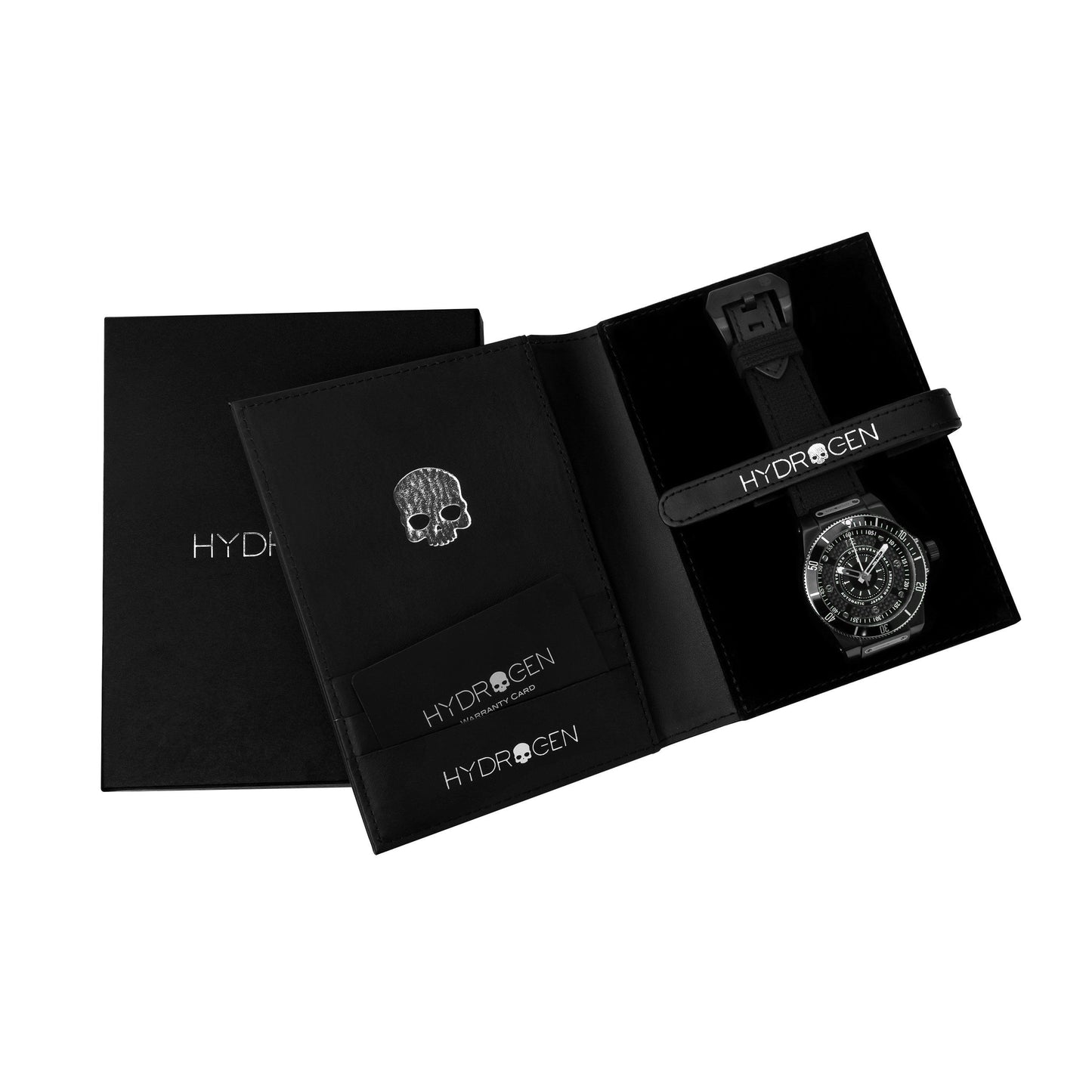 Black watch box with Hydrogen watch and skull pendant on a white background