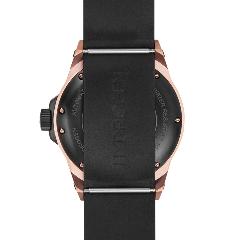 Close-up of a watch with black strap and rose gold case on a white background