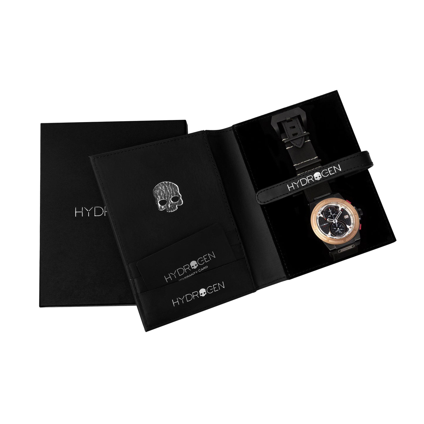Black Hydrogen watch box with a watch and skull charm on a white background