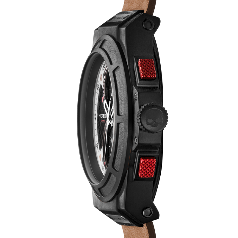 Close-up of a watch with a black case, brown leather strap, and red accents on a white background.