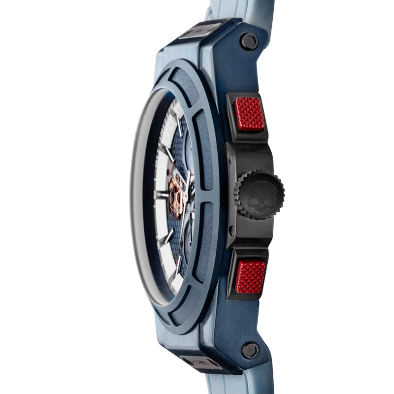 Close-up of a blue watch with red accents on a white background