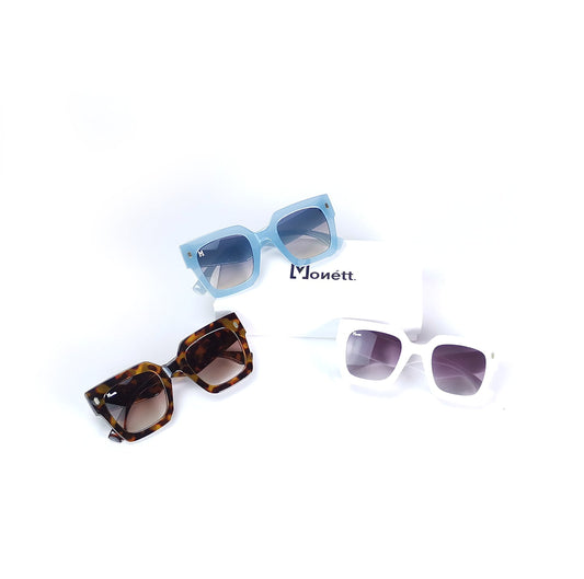 Three pairs of sunglasses with 'Monett' branding on a white background