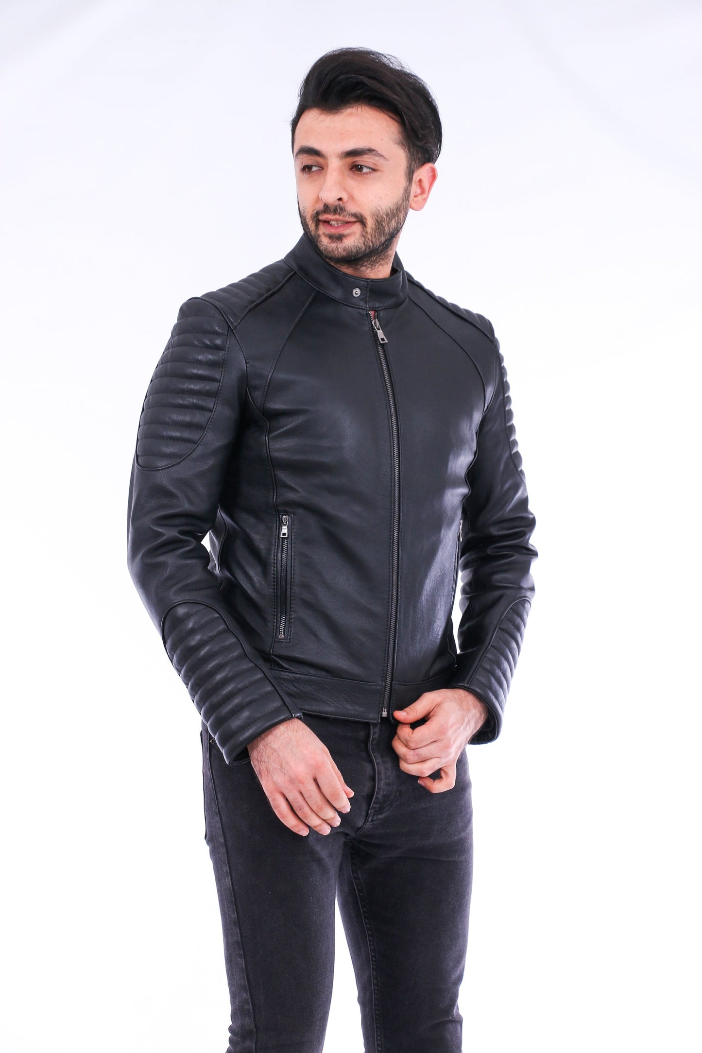 Man wearing a black leather jacket on a white background