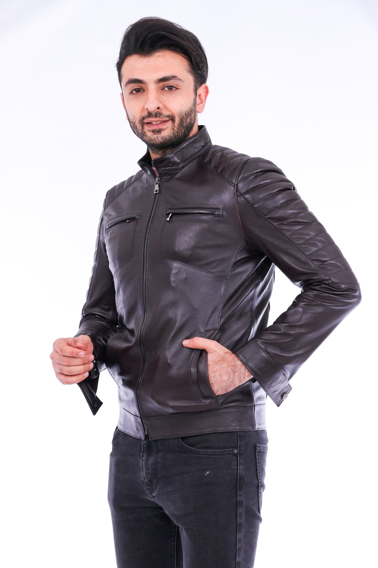 Man wearing a black leather jacket on a white background