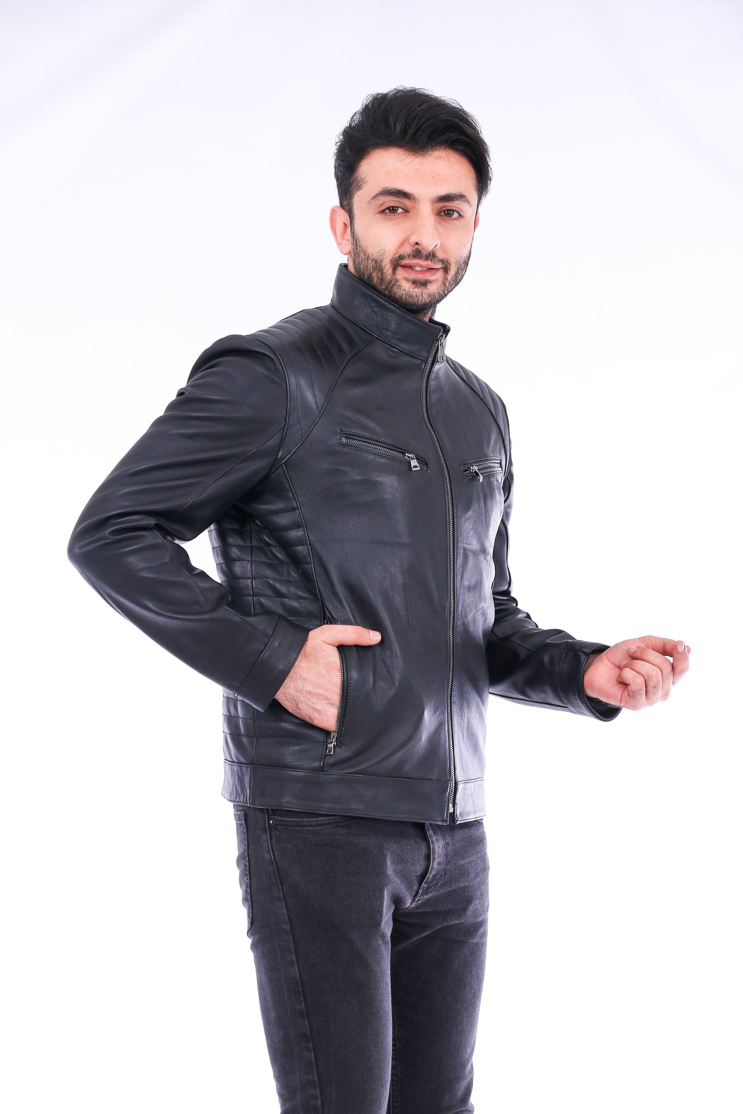 Man wearing a black leather jacket on a white background