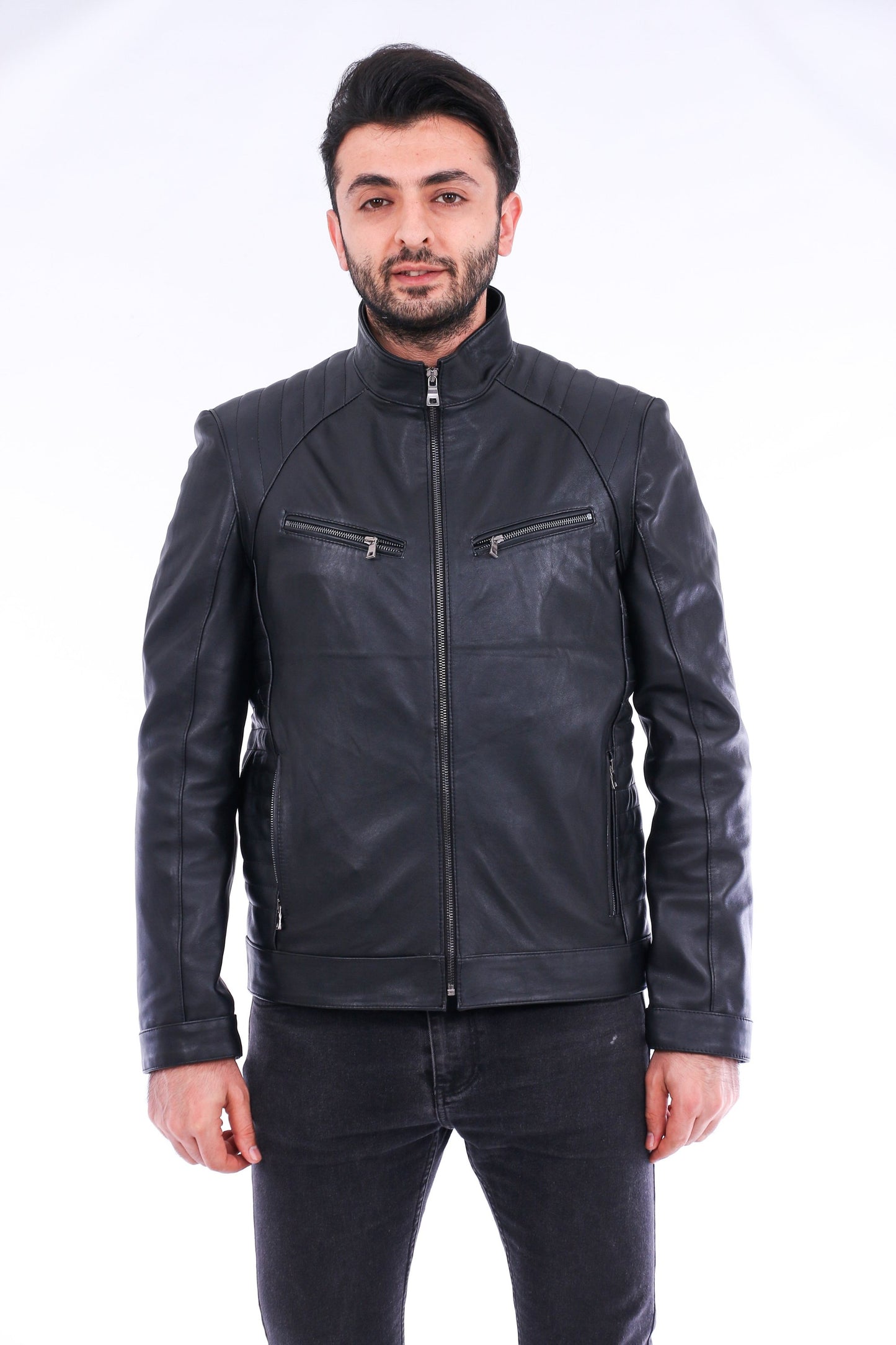 Man wearing a black leather jacket on a white background