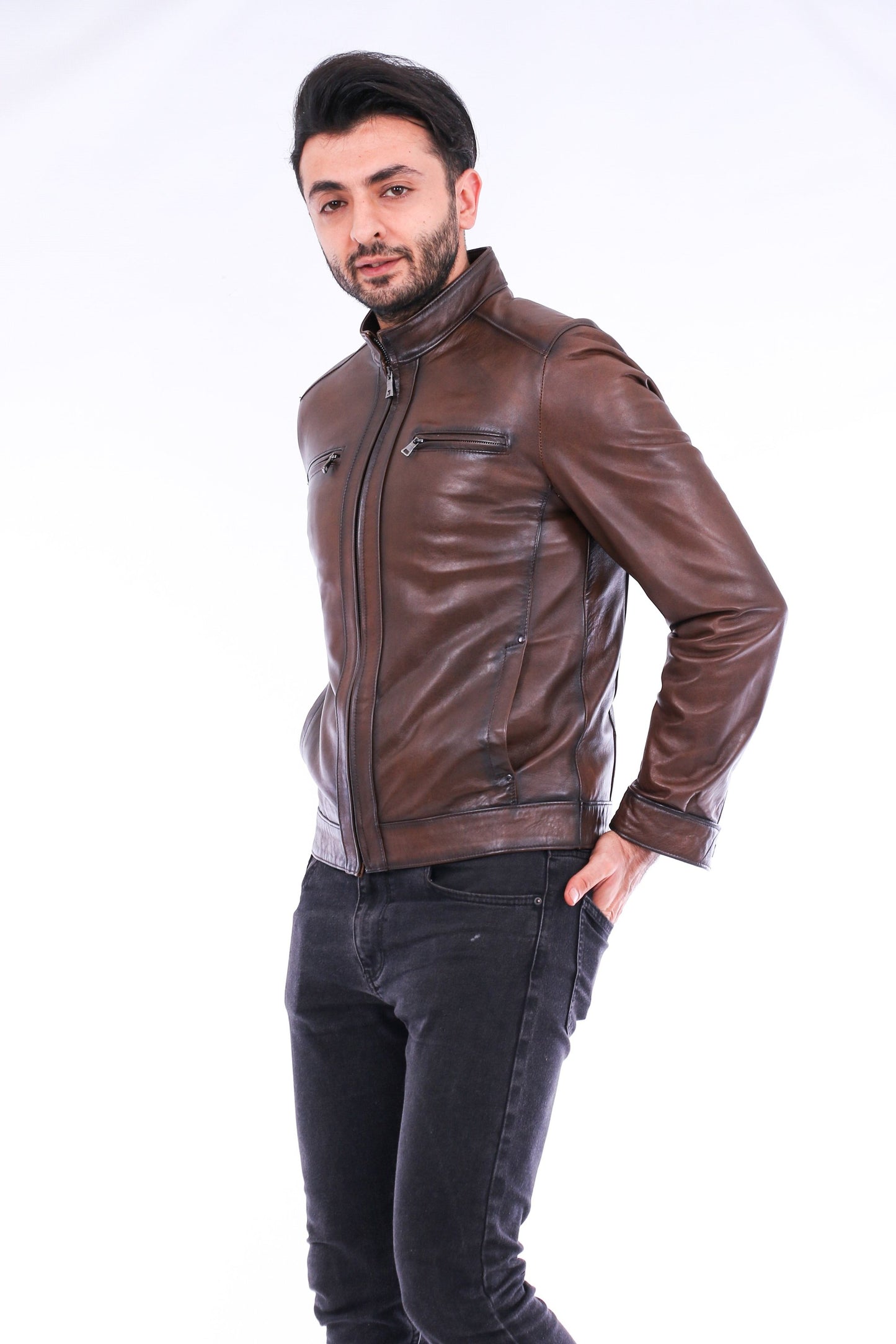 Man wearing a brown leather jacket on a white background