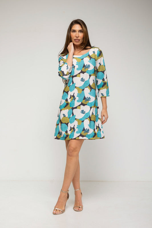 Woman wearing a floral dress on a white background