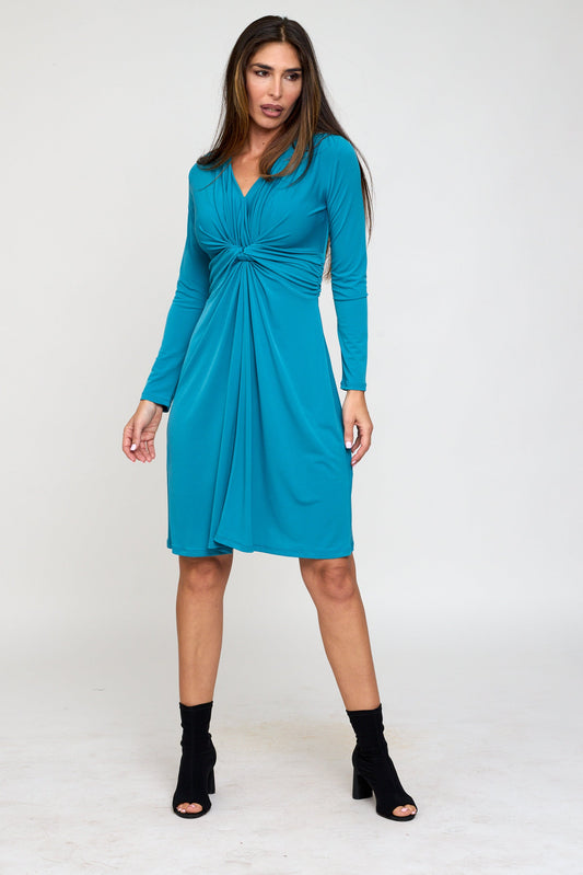 Woman wearing a blue dress on a white background