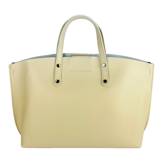 Beige handbag with a visible brand name on a white background