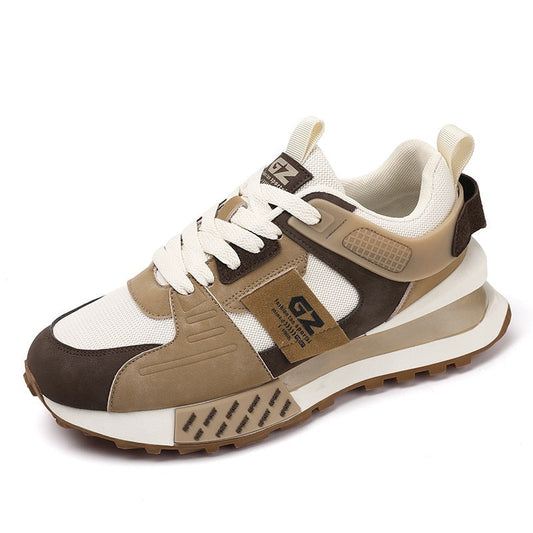 Beige and brown sneaker with white laces on a white background