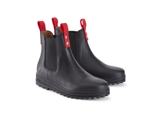 Black rain boots with red straps on a white background