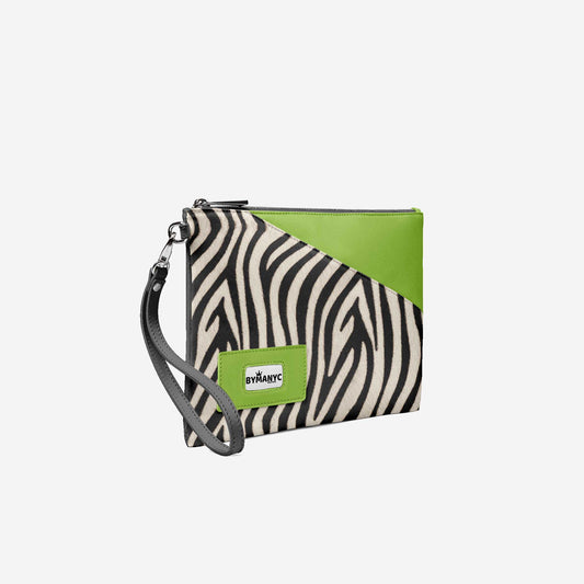 Zebra print clutch with green accents on a white background