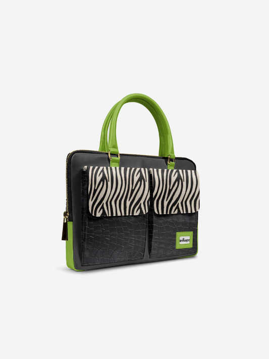 Handbag with zebra pattern and green handles on a white background