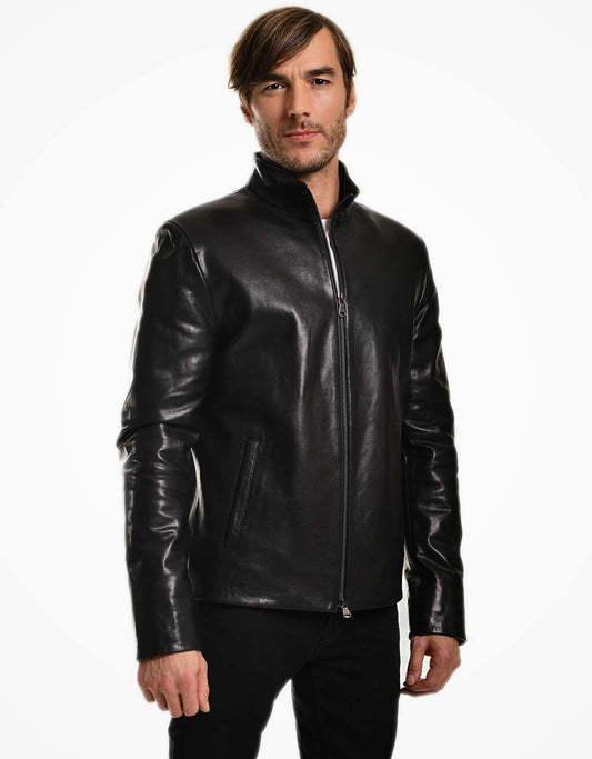 Man wearing a black leather jacket on a white background