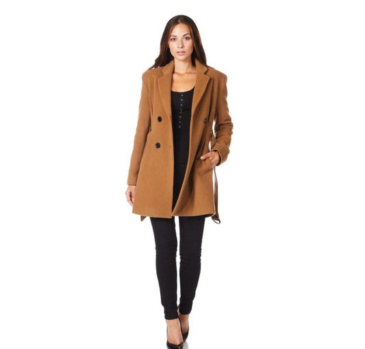 Woman wearing a brown coat on a white background