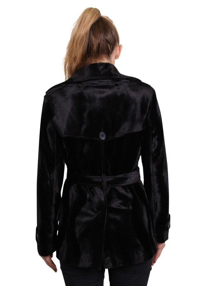 Black coat worn by a person on a white background