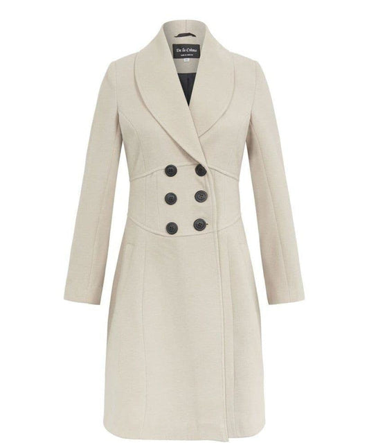 Beige coat with black buttons on a white background