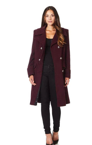 Woman wearing a burgundy coat