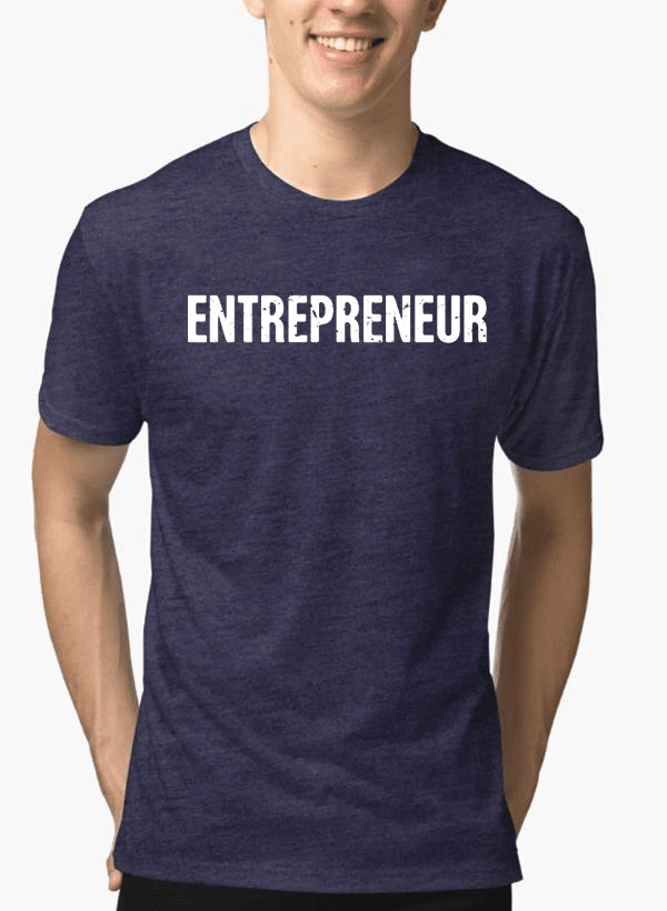 Navy blue t-shirt with 'ENTREPRENEUR' text worn by a person on a white background