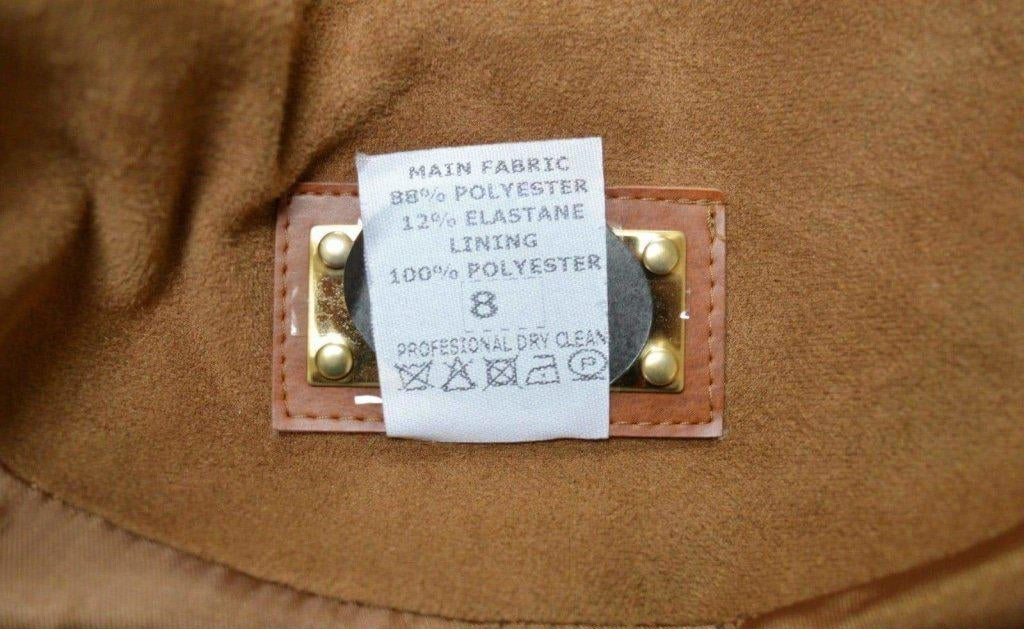 Fabric label on a brown garment