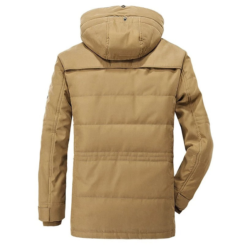 Tan winter jacket with a hood on a white background