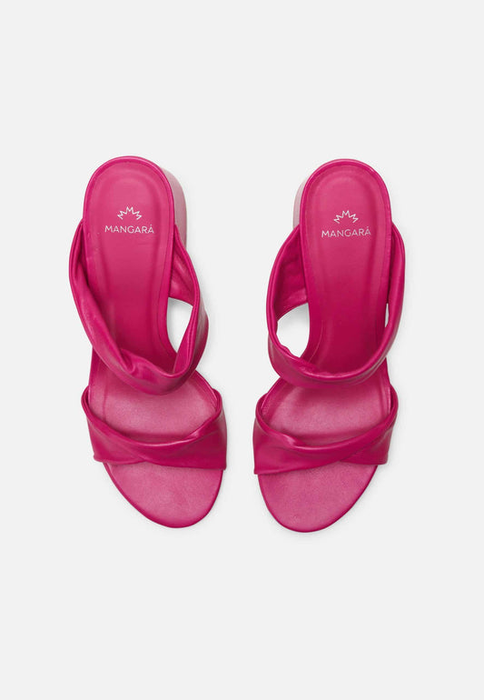Pair of pink sandals with a visible brand logo on a white background