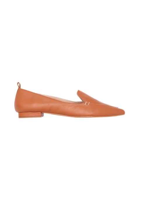 Tan leather flat shoe on a white background