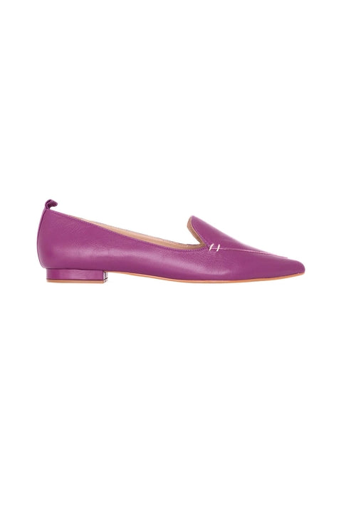 Purple flat shoe on a white background