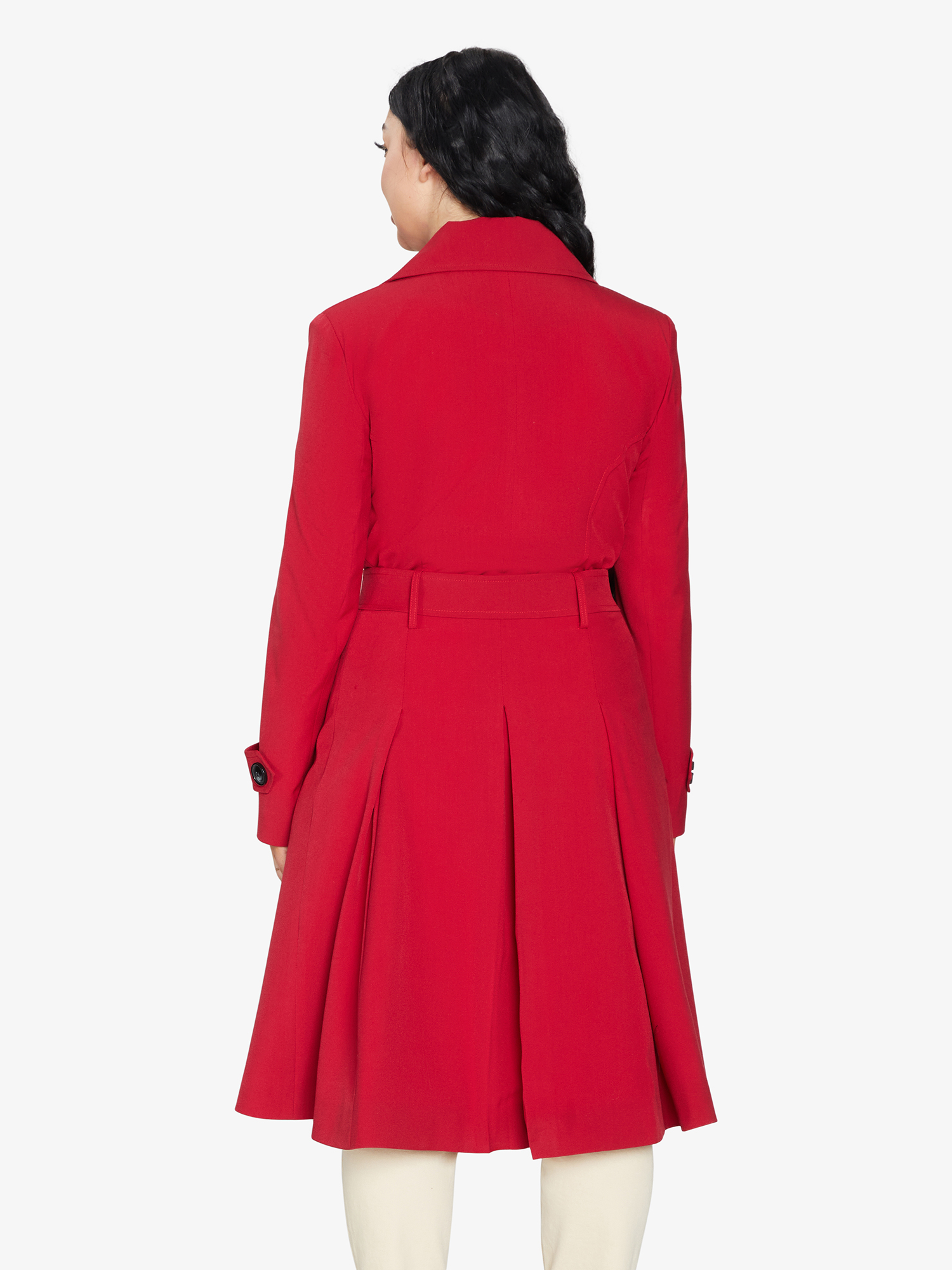 Person wearing a red coat on a white background