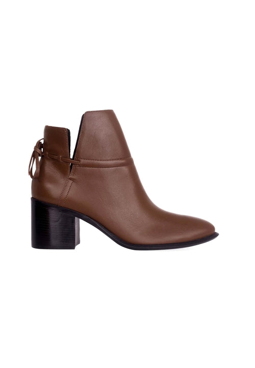 Brown leather ankle boot on a white background