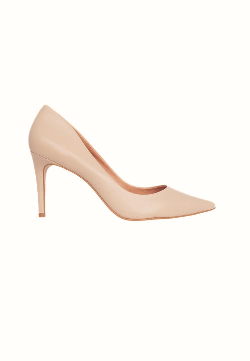 Nude-colored high-heeled shoe on a white background