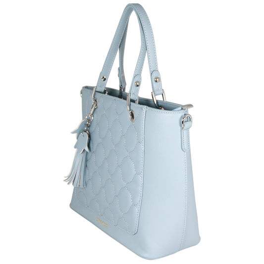 Light blue handbag with a tassel on a white background