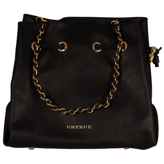 Black handbag with gold chain handle and branding on a white background