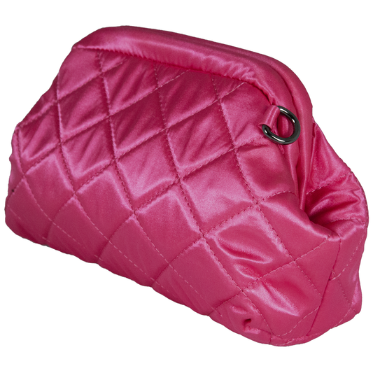 Pink quilted handbag on a white background