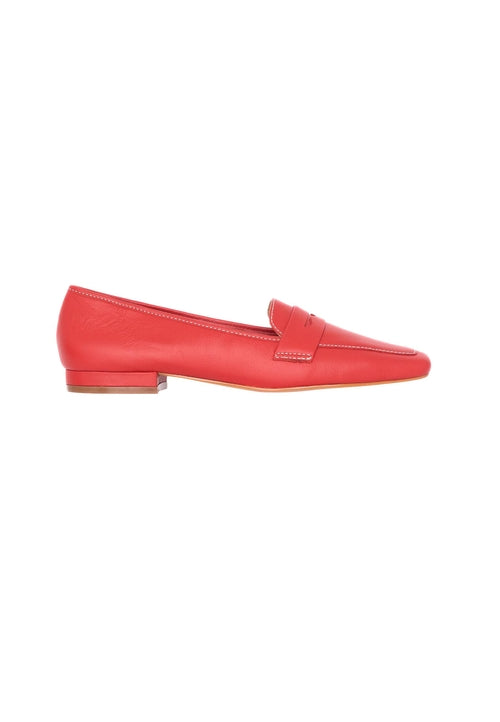 Red loafer shoe on a white background