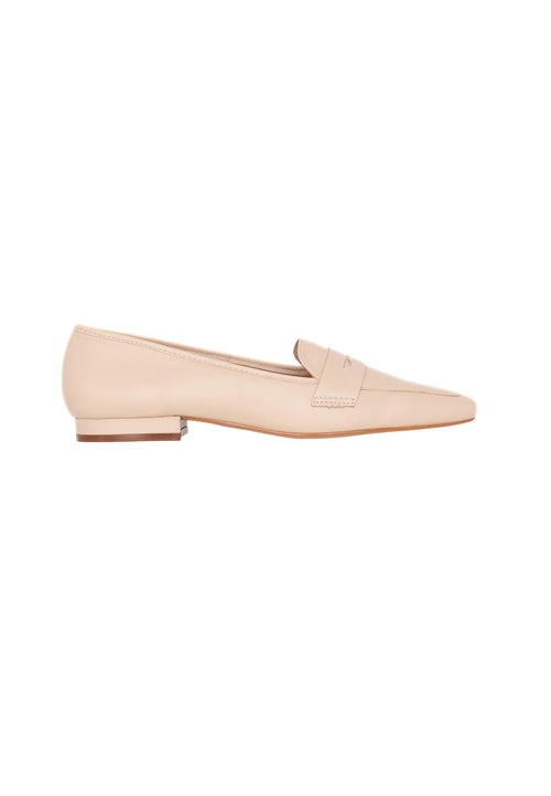 Nude-colored loafer shoe on a white background