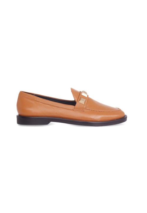 Tan leather loafer shoe on a white background