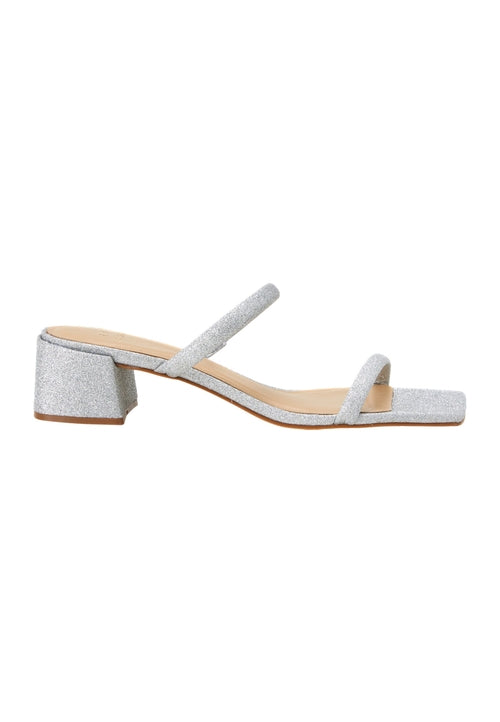 Silver sandal with a block heel on a white background
