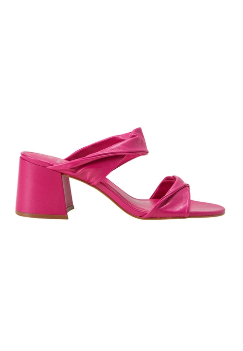 Pink sandal with a block heel on a white background
