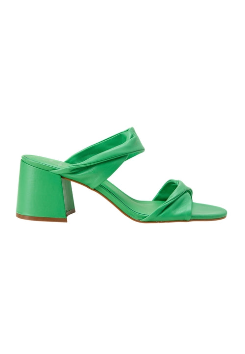 Green sandal with a block heel on a white background