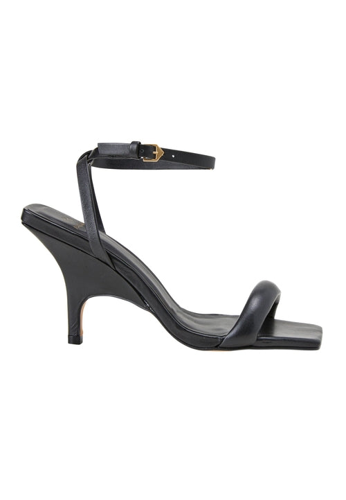 Black high-heeled sandal with thin strap on a white background