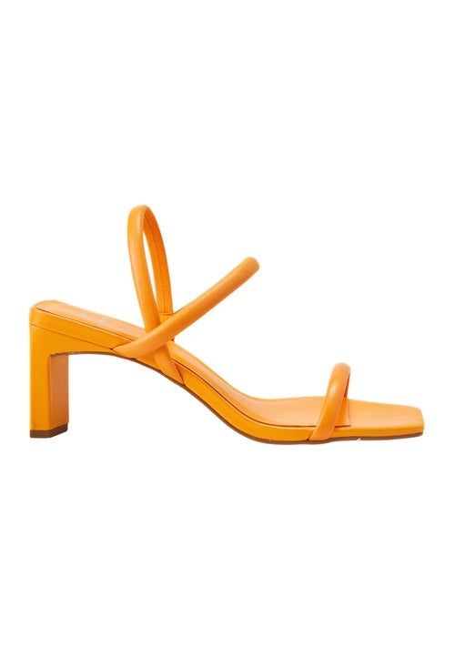Orange sandal with a block heel on a white background