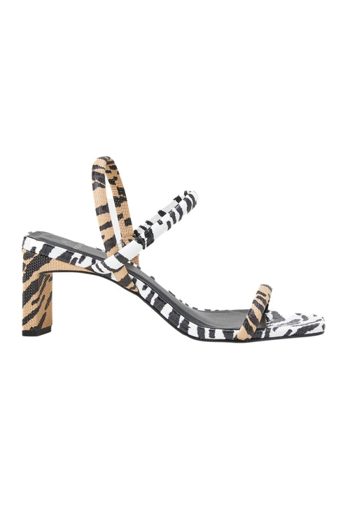 Zebra print sandal with a block heel on a white background